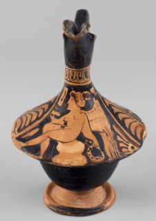 Red-figure epichysis with a depiction of Eros; palmettes (iconographic); southern Italian pottery;
