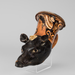 Red-figure rhyton in the shape of a boar's head, Stoke-on-Trent Group (c. 300 BC). Southern Italic
