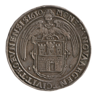 Half-length portrait of the king to the right, wearing a crown and armor, holding an orb and a