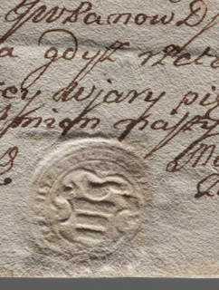 Round seal impression of the town of Bilgoraj, Lublin Voivodeship. On the decorative shield the
