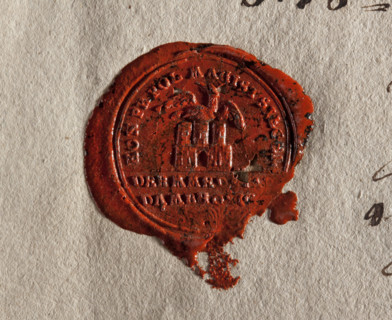 Round wax impression of the town seal of Dombrowice (Dabrowice). In the upper field a wall with an