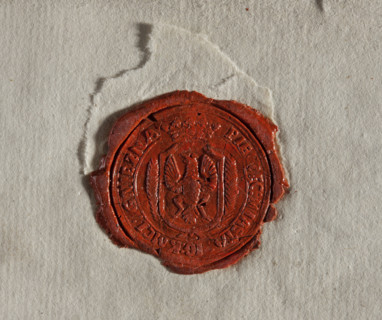 Round wax impression of the seal of the city of Gniezno. On the crowned shield a single-headed