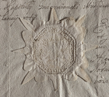 Rectangular seal impression with truncated corners of the town of Grzybowo. Depicts a