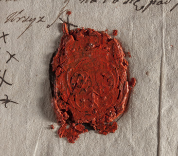 Oval wax impression of the seal of the town of Iwaniska. On a decorative crowned shield, three