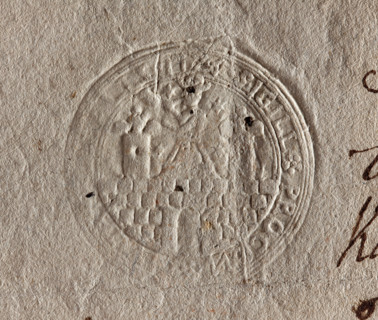 Round seal impression of the city of Kalisz. On the wall with an open gate there is a figure with a