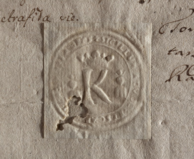 Imprint of the seal of Kazimierz. Under the royal crown, the letter K. On the sides, two busts with