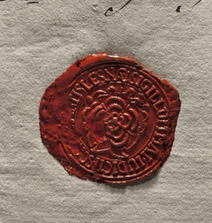 Round imprint of the lay judge-mayor seal of the town of Leszno. In the central part — a rose