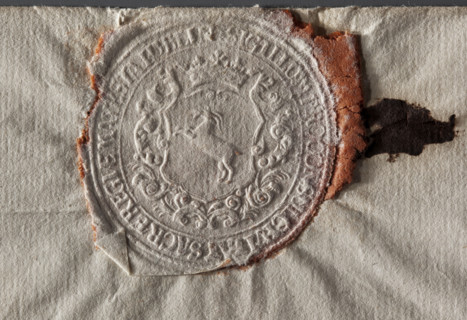 Round imprint of the seal of the city of Lublin. In a decorative cartouche under a nobleman's