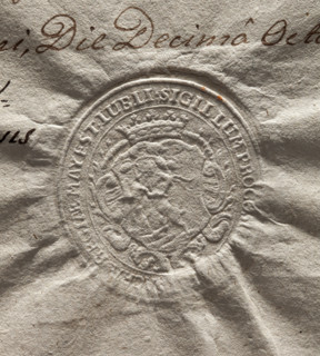 Oval imprint of the city of Lublin. In a baroque cartouche under a nobleman's crown, a goat