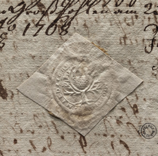 Round seal impression of the city of Miedzychód. Among the branches of a tree with marked roots — a