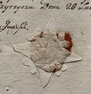 Round seal impression of the town of Miedzyrzecz. In the central part of the seal, an illegible