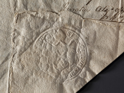 Round seal impression of the town of Mstów. Under the bishop's mitre, a baroque cartouche with two