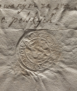 Round seal impression of the town of Odrzywól, Sandomierz Voivodeship. In the central part, in a