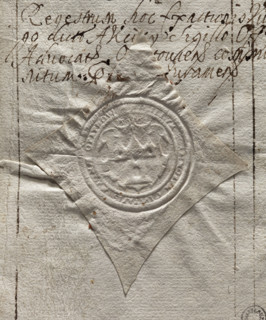 Round seal imprint of the town of Opatów, Sandomierz Voivodeship. In a decorative cartouche there