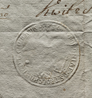 Round seal impression of the town of Ostroleka, poorly legible. Eagle holding a scepter and an orb