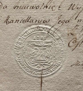 Round seal impression of the court of lay judges and mayors of the town of Ostrzeszów. On the