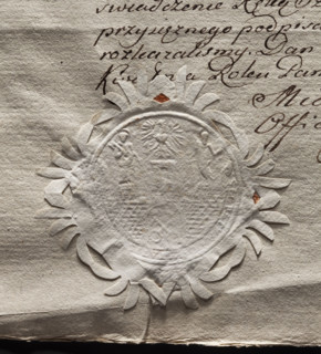 Circular imprint of the seal of the city of Poznan. City wall with an open gate, within it two