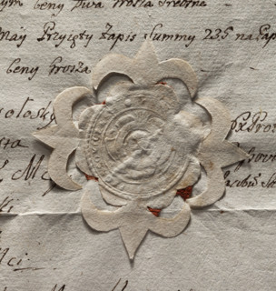 Round seal impression of the town of Proszowice, Kraków Voivodeship. In a round, baroque cartouche