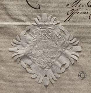 Circular imprint of the seal of the city of Poznan. City wall with an open gate, within it two