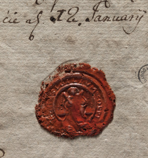 Round wax impression of the seal of the town of Przemet. In the central field, the figure of Saint
