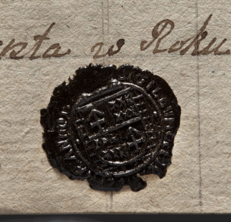 Round wax impression of the seal of the town of Rydzyna. On the field, a shield divided quarterly: