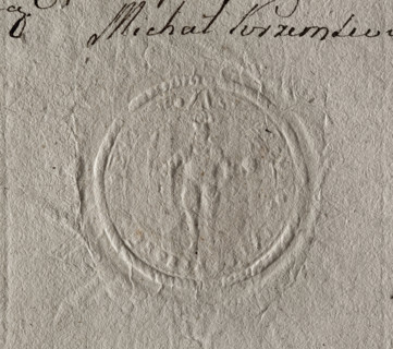Round seal impression of the town of Skaryszew near Warsaw. In the central field, a knight in