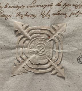 Round seal impression of the town of Slomnik, Sandomierz Voivodeship. In the cartouche a