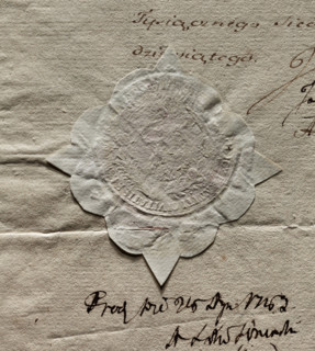 Round impression of the seal of the City of Warsaw. The drawing in the palm branch cartouche is
