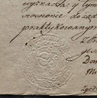 Round impression of the seal of the city of Warsaw. In a wreath of oak branches a mermaid with a