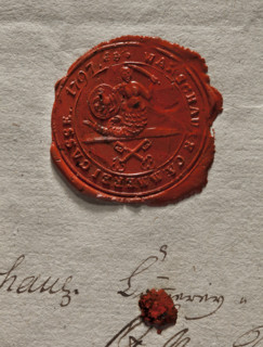 Round wax impression of the seal of the city of Warsaw. A mermaid with a fish tail, a sword in her