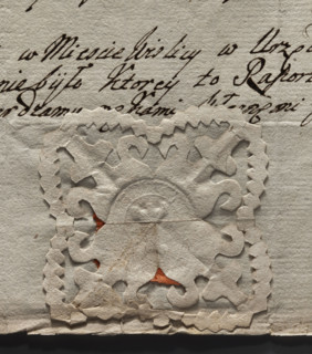 Oval seal impression of the town of Wislica. Tower with a gate and three battlements. Illegible