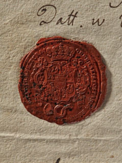 Oval wax impression of the seal of the General Post Office. Crowned shield, richly decorated with