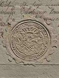 Round imprint of the seal of the Debt Liquidation Commission of the Republic of Poland. On the