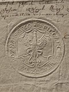 Round seal of the Poznan Voivodeship. Dry impression on a document; round land seal with an eagle