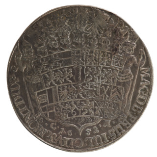 Thaler: Obverse half-figure in decorative armour girded with a sash, sceptre in right hand, helmet
