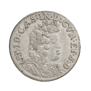 Obv. In the border, a male bust in armor and a wig turned to the right, separating the inscription