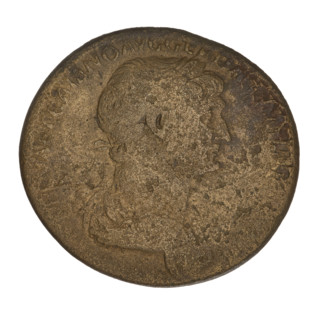 Sestertius of Trajan (53–117 CE; emperor 98–117). Obverse: laureate head of Trajan facing right;