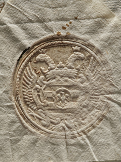 Two seal impressions on a document. Two seal impressions with a double-headed crowned eagle and a