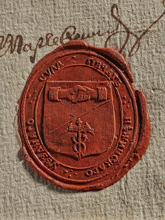 Oval seal of the district court in Niezyn. Coat of arms bipartite, left diagonal: in the upper red