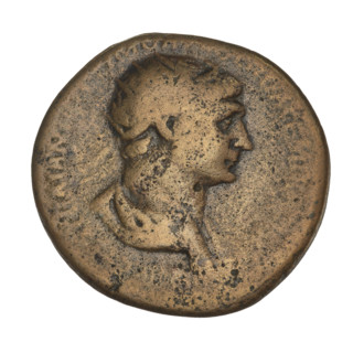 Dupondius of Trajan (98–117 AD). Obverse: radiate crowned head of Trajan; rim inscription illegible