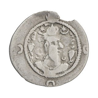 Drachma of Khosroes I (Khosroes Anoshirvan), ruler of Persia (531–579). Obverse: bust of Khosroes I