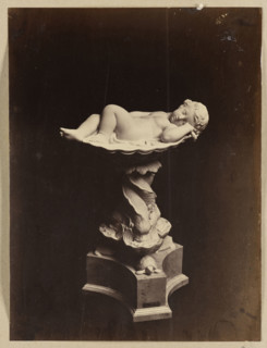 Photograph of the sculpture Cupid sleeping in a shell by Wiktor Brodzki; sculptor Wiktor Polearch