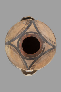 Stamnos, globular vessel with a small flattened bottom and a widely flared high rim; upper part of