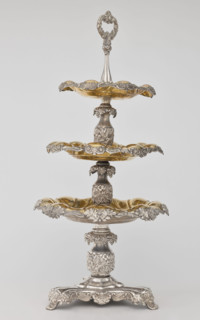 Etazera by Józef Fraget (Warsaw; silver and plated goods factory; 1824–1945). Three-tiered platter
