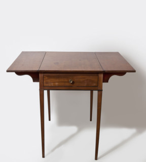 Table, rectangular, with flaps on the long sides and a drawer on one of the short sides, supported