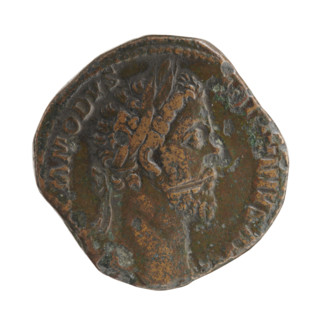 Sestertius of Commodus (161–192; Roman emperor 177–192). Obverse: Head of Commodus with a laurel