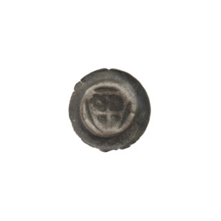 Denarius - bracteate: triangular shield with a cross whose arms reach the edge; in both upper