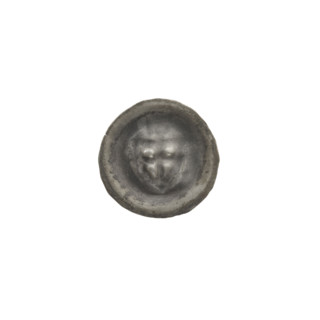 Denarius — bracteate; triangular shield with a cross whose arms reach the edge, a cross above it;