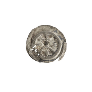 Denarius (bracteate) depicting a cross on an arcade, moon, crescent with a ball, and stars;