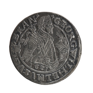 Obv. A bust in armor turned right, girded with a sash. A sceptre in his right hand. In front of the